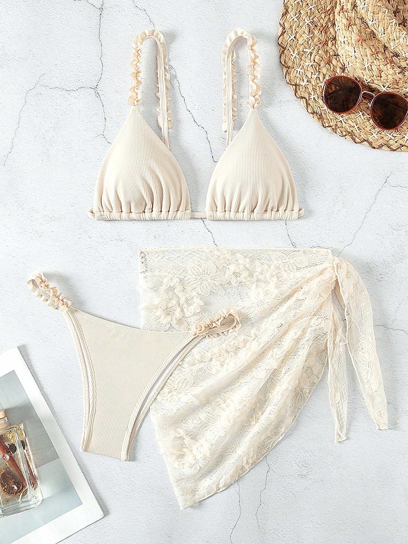 TRAJE DE BAÑO CON PAREO TEJIDO