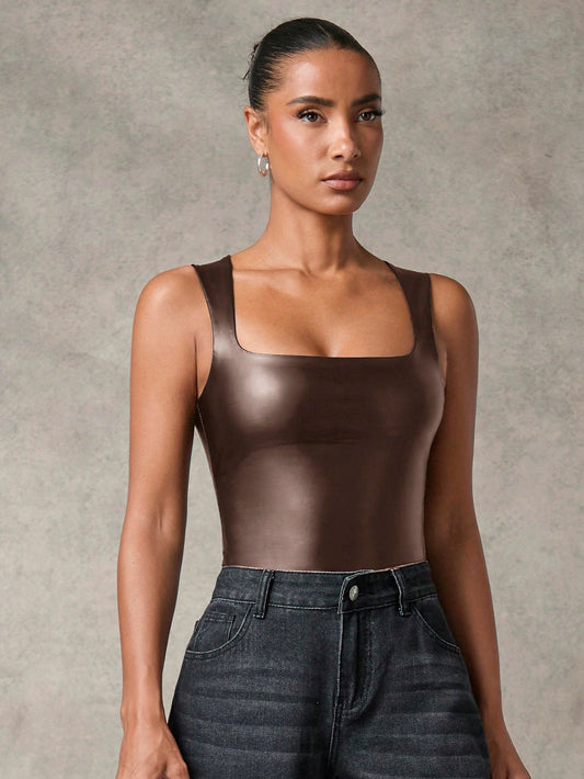 BODY MARRÓN DE CUERINA