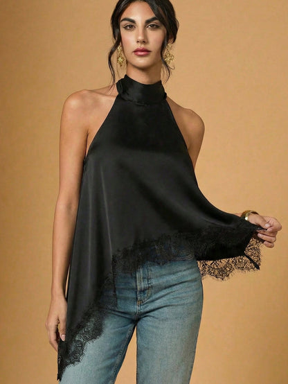 TOP HALTER ASIMÉTRICO CON ENCAJE